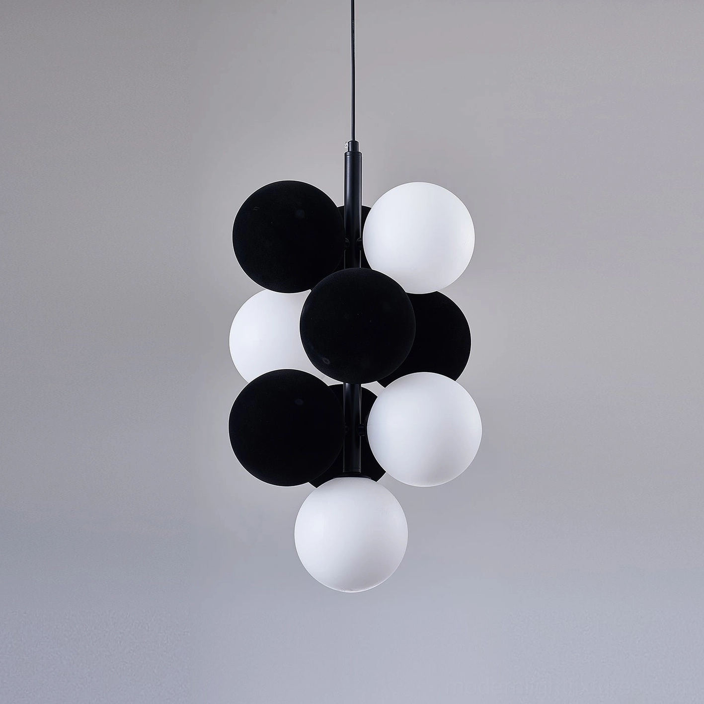 Bubble cluster pendant light in dining room ambiance with warm diffused glow