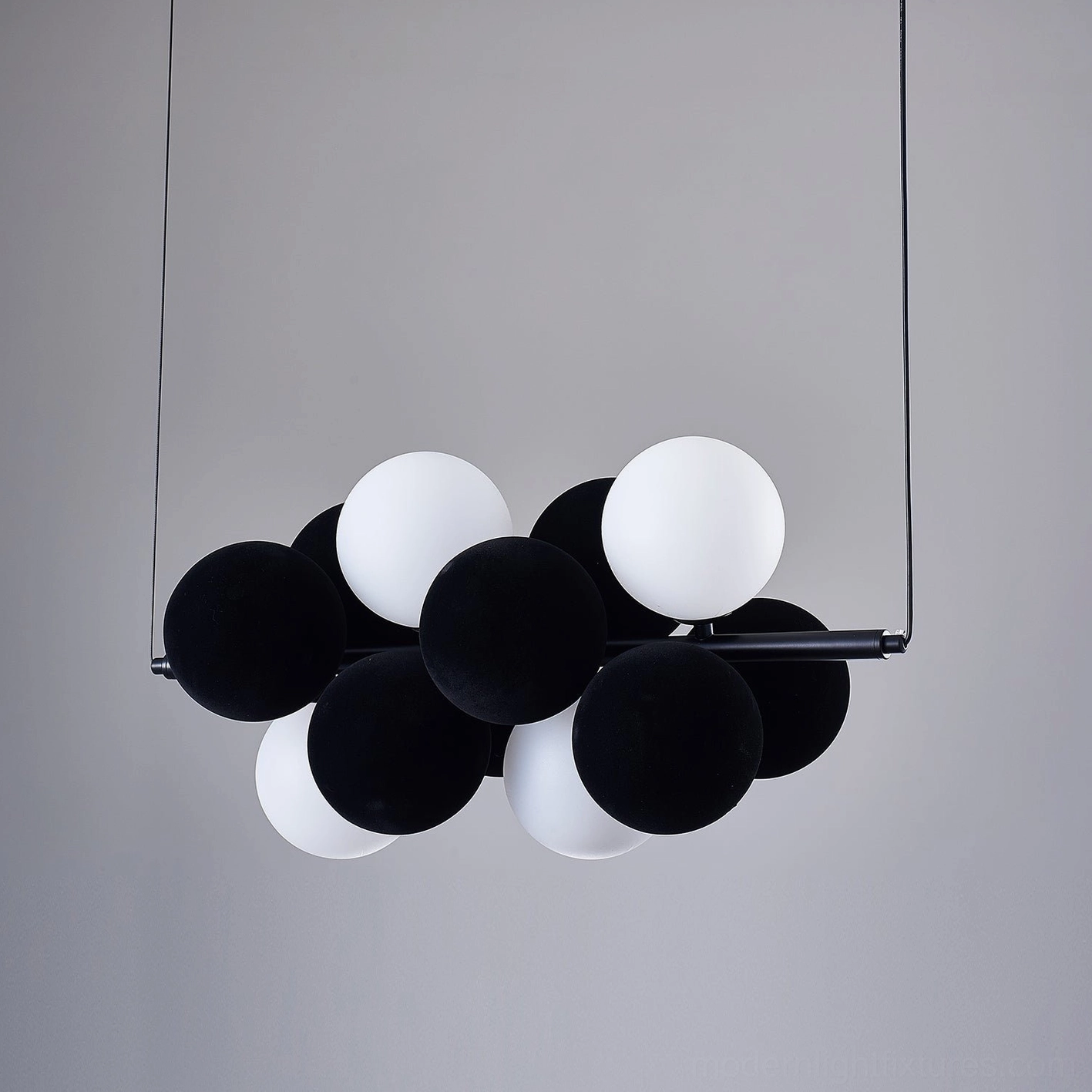 Bubble cluster pendant light in industrial luxury eclectic interior with metal accents