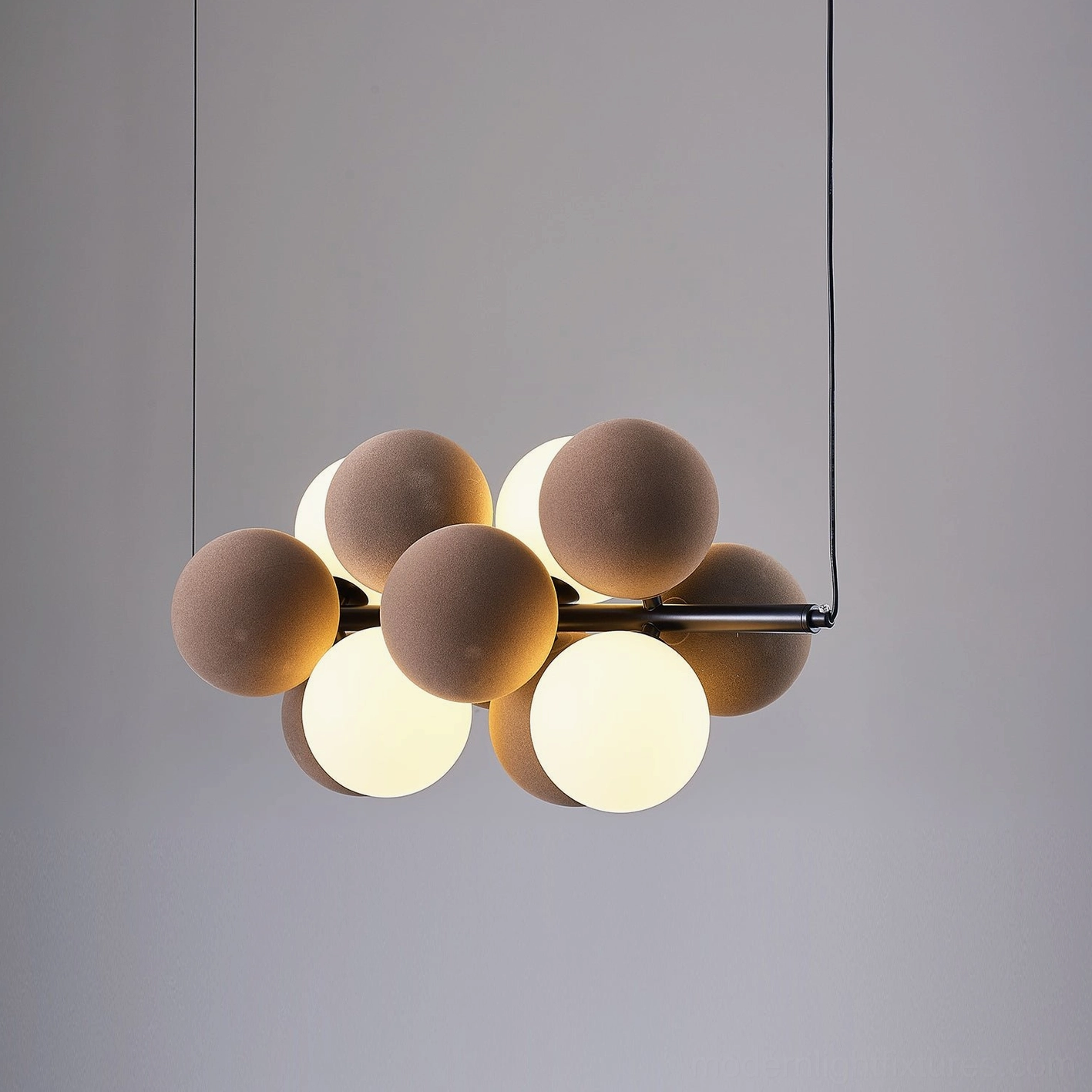 Bubble cluster pendant light showing sphere texture detail and warm illumination quality