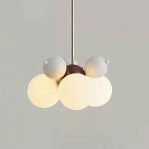 Bubble cluster pendant lamp with wine red and milk white glass spheres - modern minimalist design direct front view