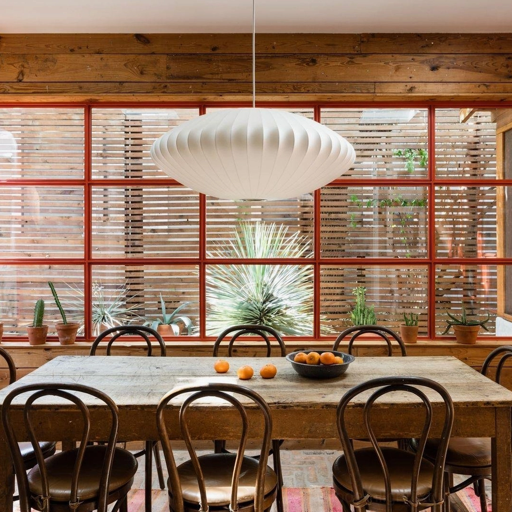 Multiple bubble pendant lights staggered height - cluster installation design