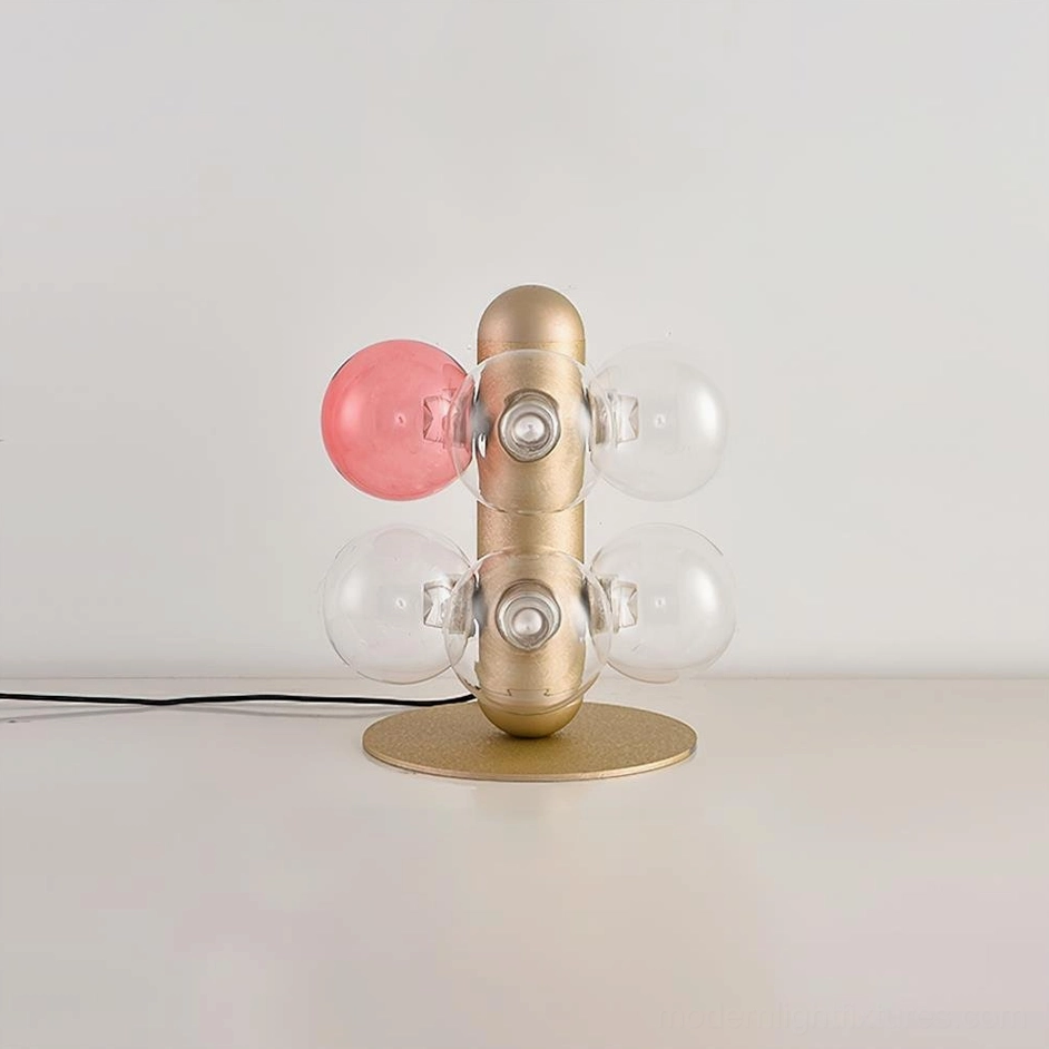 Glass bubble table lamp left side profile view, showing partial glass spheres and metal fixture construction