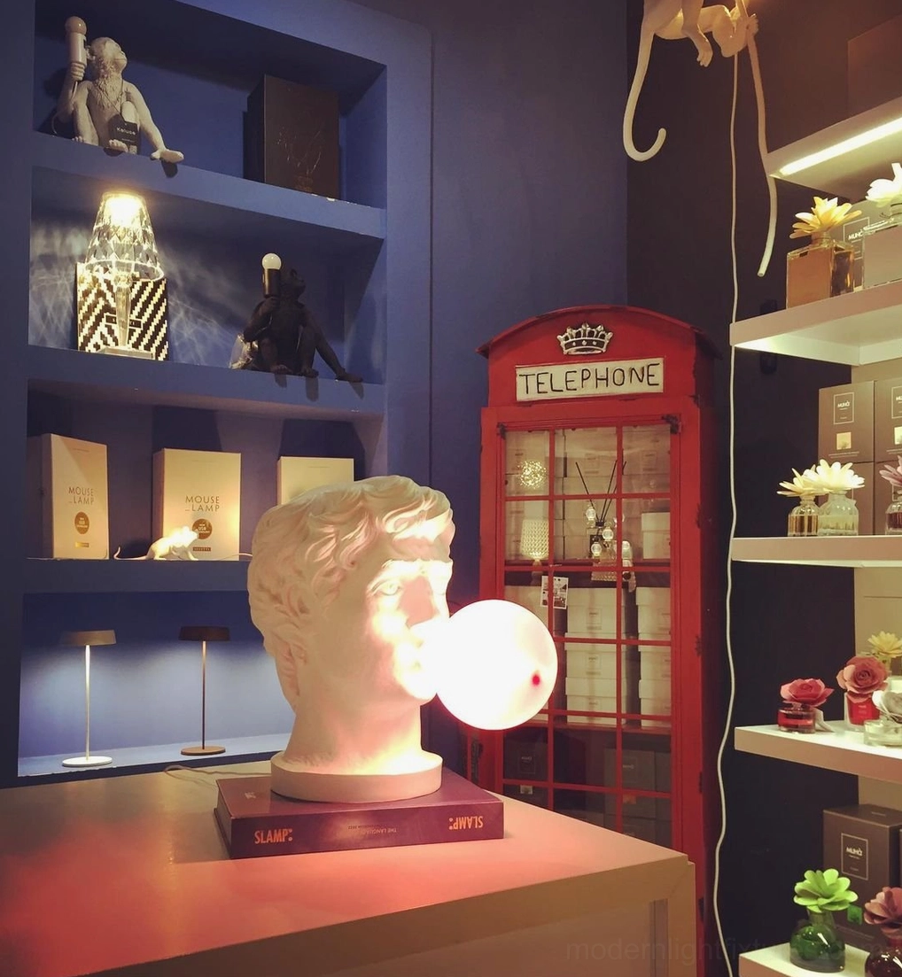 Bubblegum Boy resin lamp in eclectic maximalist interior with mixed decor and artistic elements