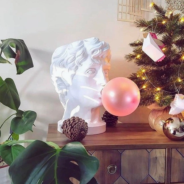 Bubblegum Boy table lamp detail showing pink frosted glass globe texture and refraction effect