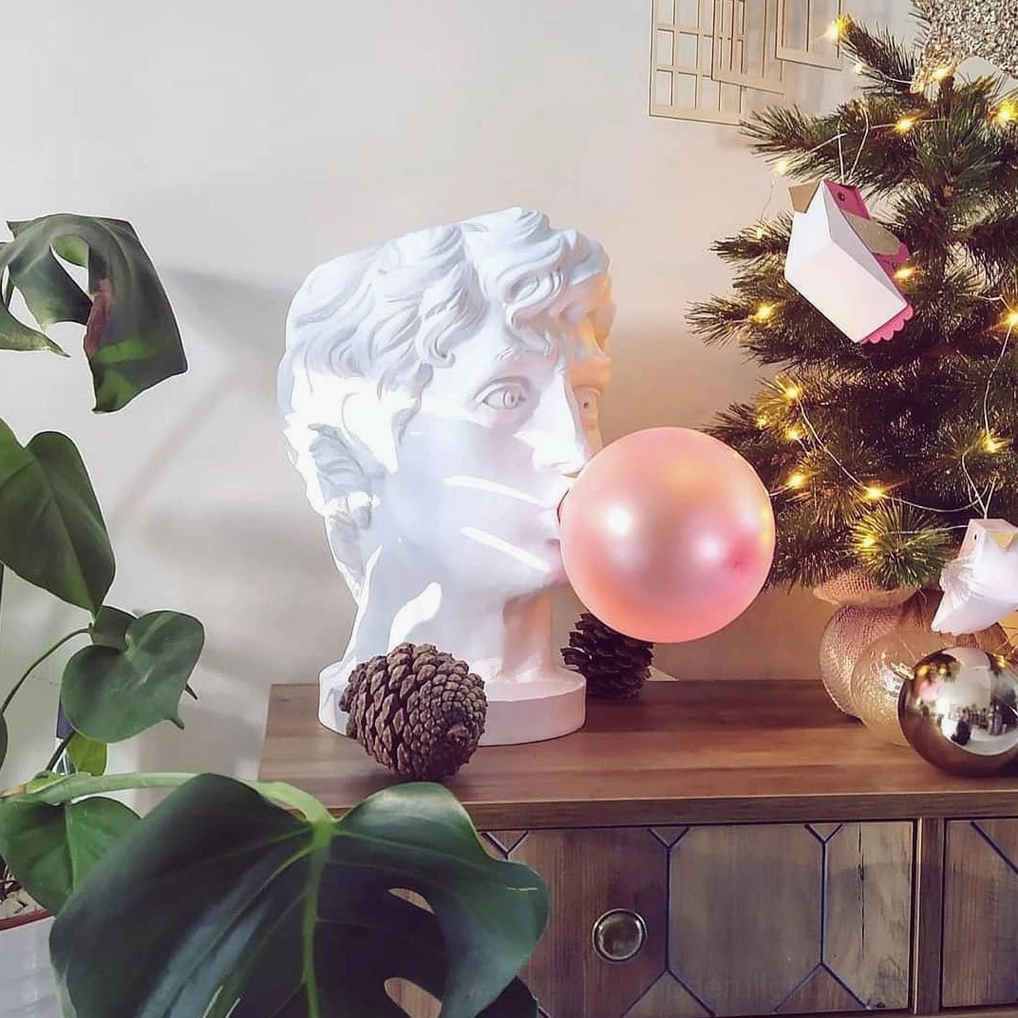 Bubblegum Boy sculptural table lamp unlit showing resin detail and finished aesthetic off-state