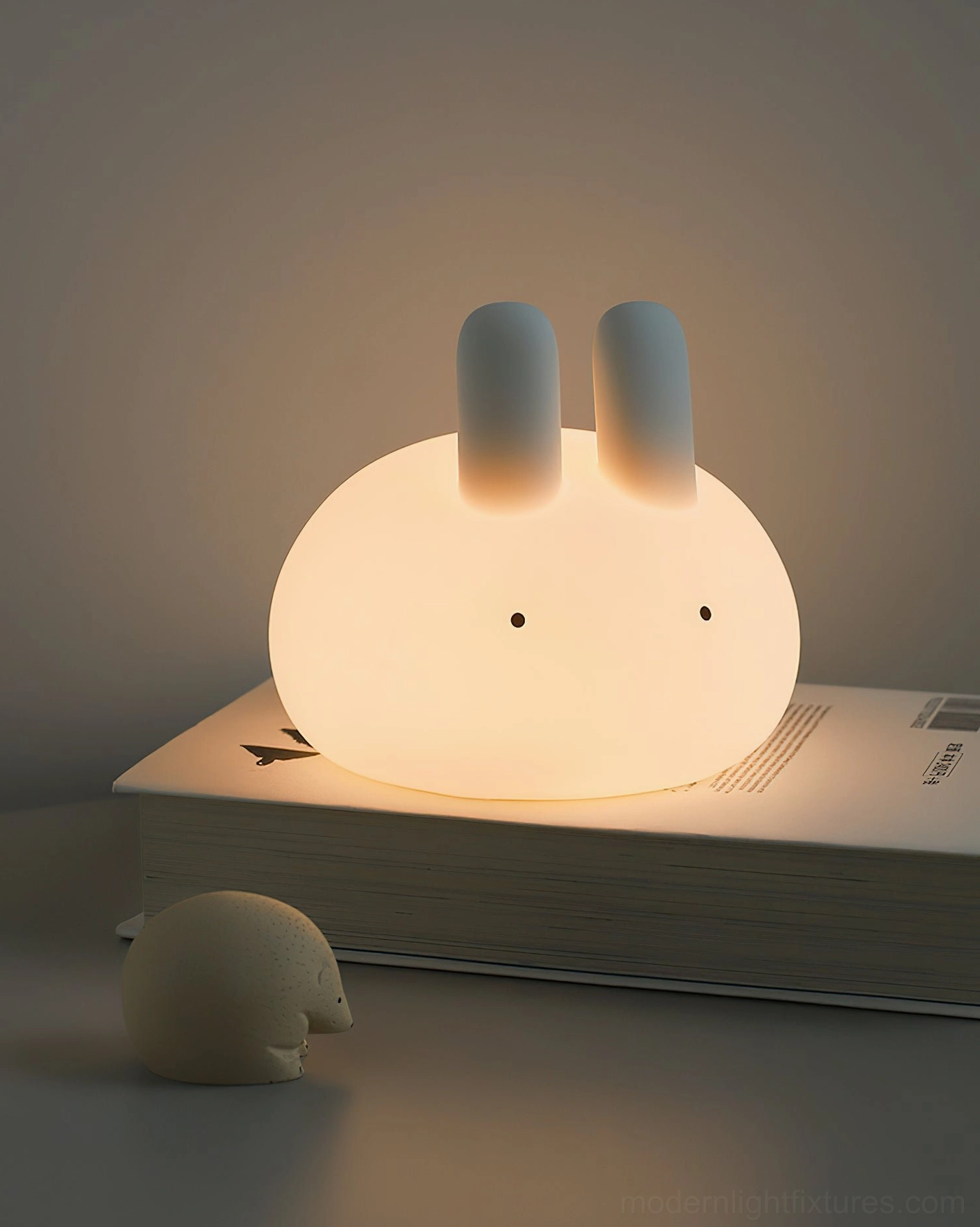 USB Type-C charging port detail on bunny night light base, modern charging technology
