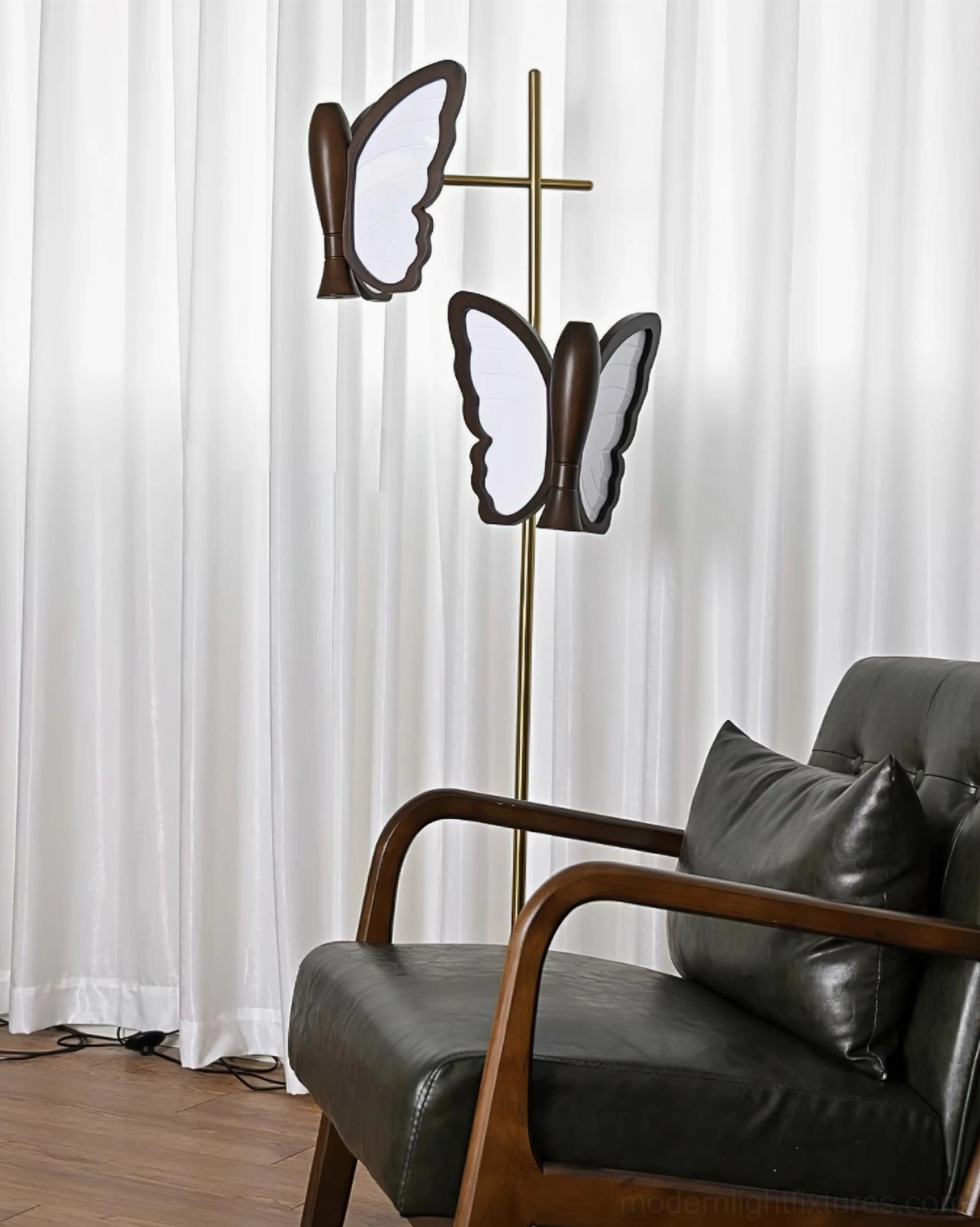 Butterfly floor lamp full height view, dual sculptural butterfly heads, contemporary lighting fixture silhouette