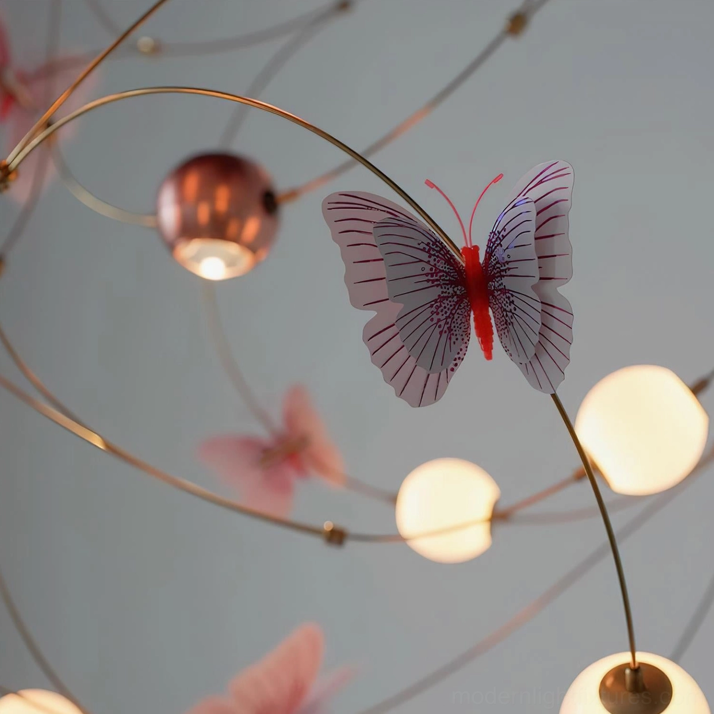 Butterfly-inspired pendant chandelier featuring warm 3000K integrated LED and decorative translucent butterfly elements