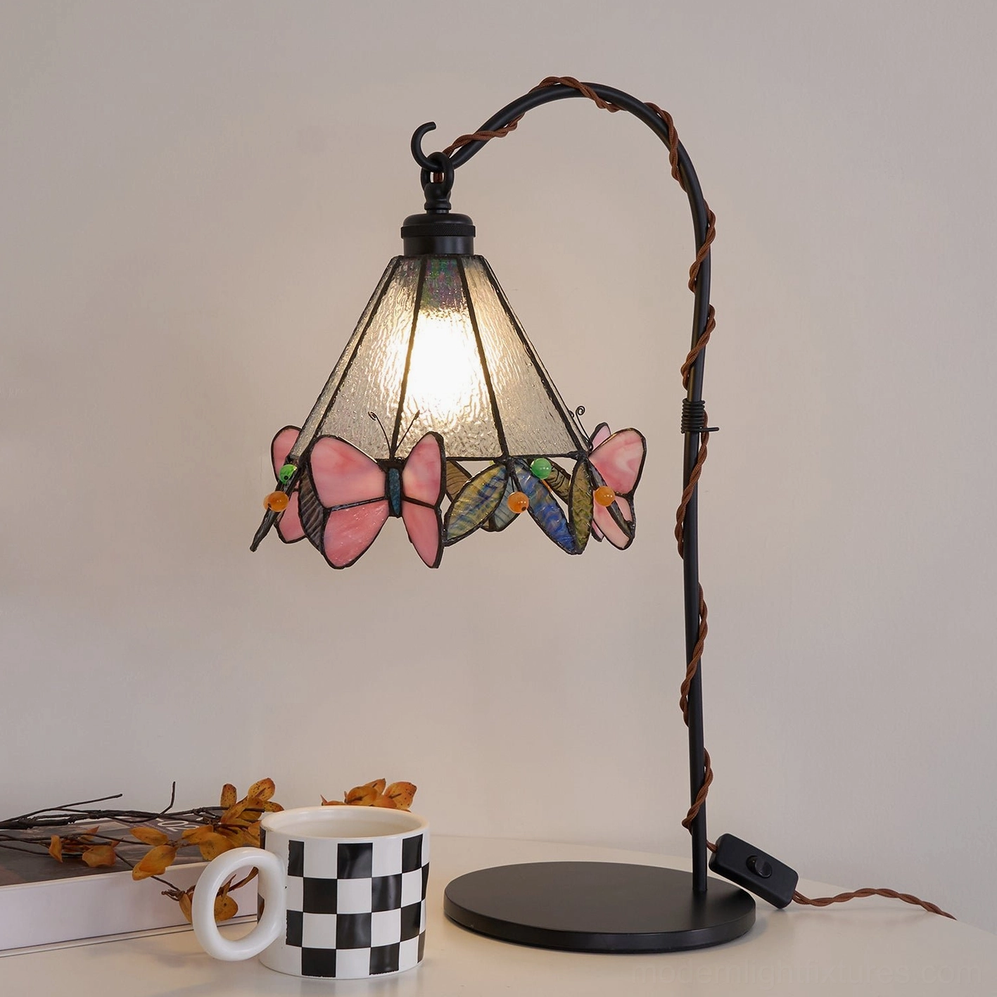 Stained glass butterfly table lamp angle view showcasing artistic glass detailing
