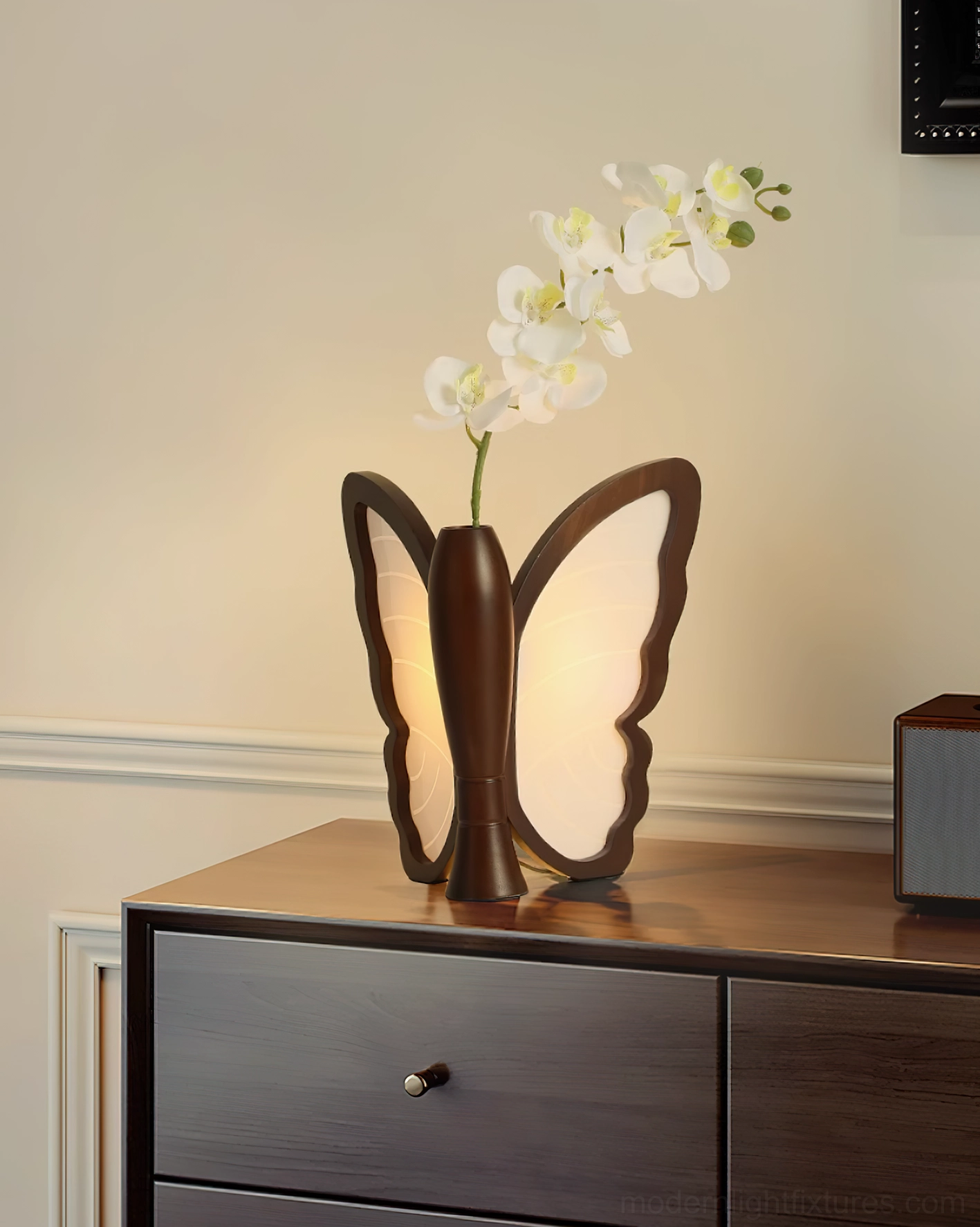 Butterfly table lamp product shot showing complete sculptural form and integrated decorative vase feature