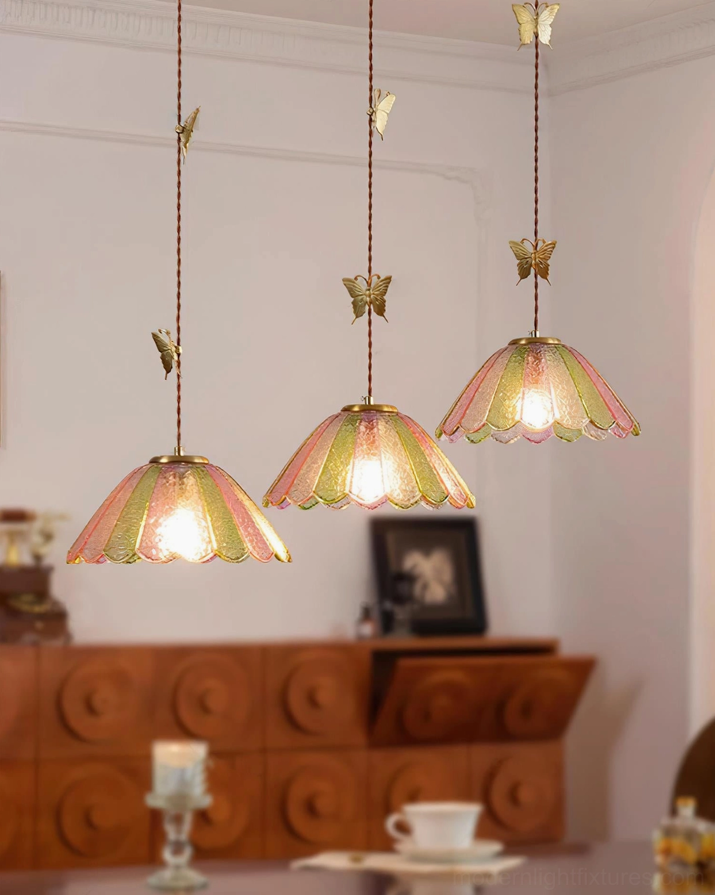 Single butterfly pendant lamp installation view, showing cord length and ceiling mount