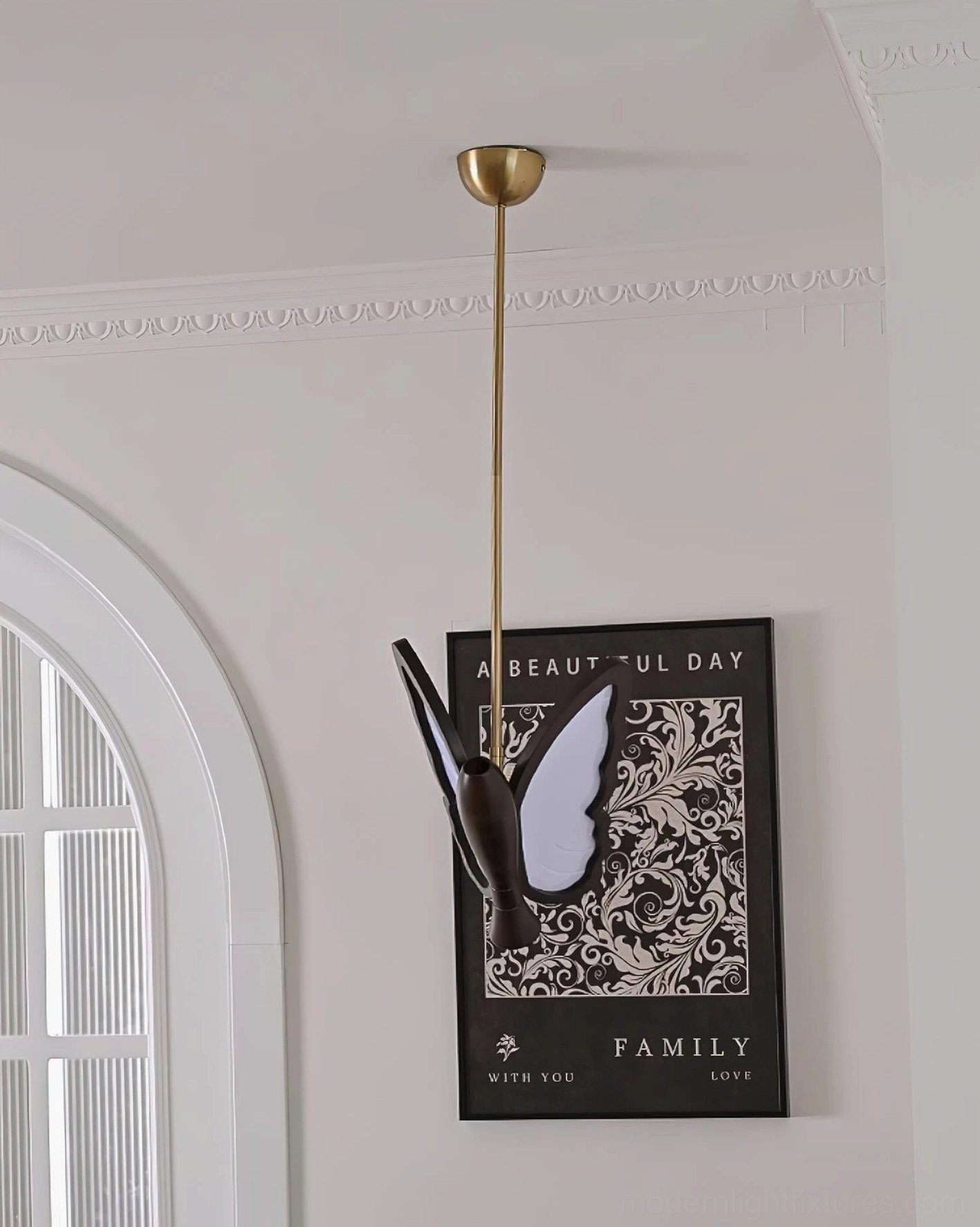 Butterfly pendant lamp installation showing hanging rod adjustment and ceiling mounting capability