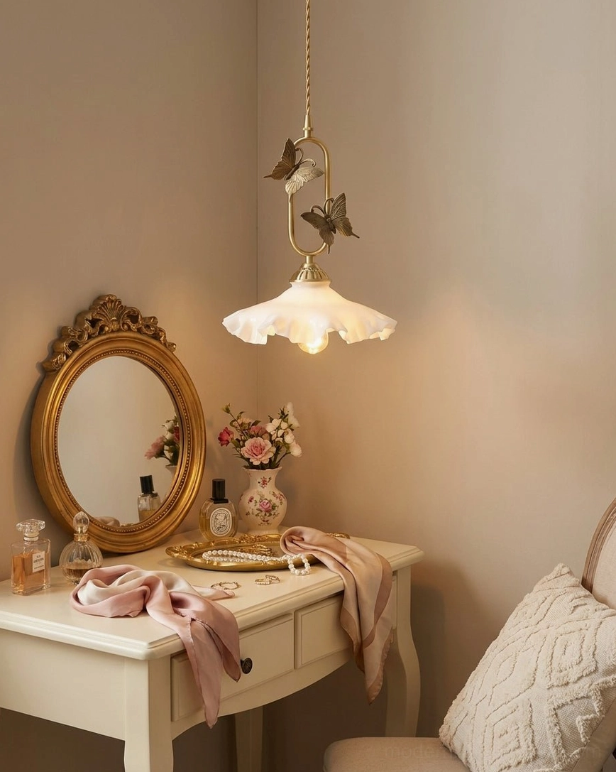 Butterfly pendant light in farmhouse dining room with natural wood table, warm 2700K bulb creating cozy ambiance