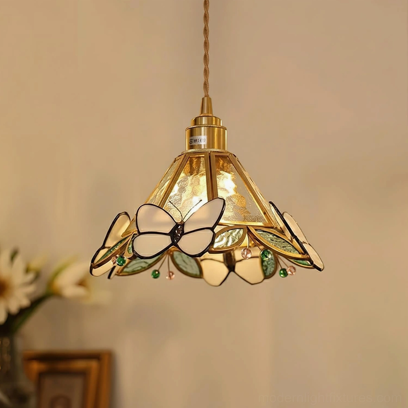 White butterfly pendant lamp featuring handcrafted stained glass and decorative brass frame detail