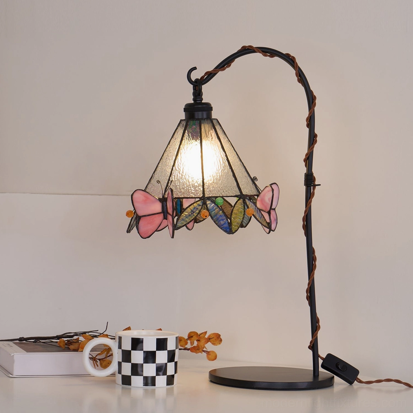 Stained glass butterfly table lamp with multiple color variations displayed