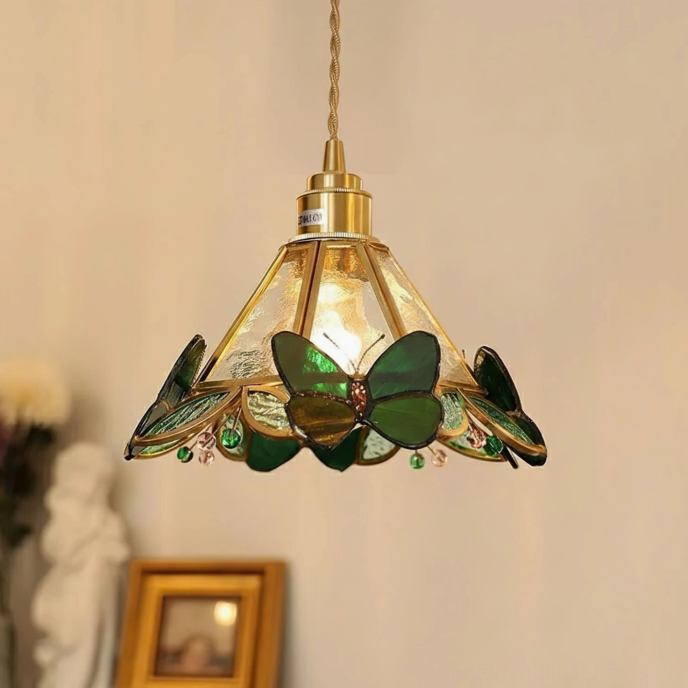 Green butterfly stained glass pendant lamp with detailed glass butterflies and elegant brass frame construction