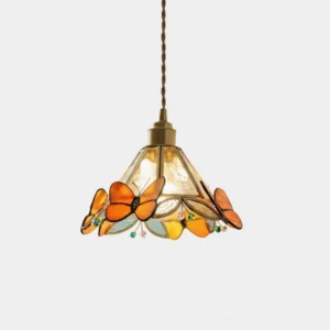 Close-up view of brass butterfly stained glass pendant lamp with orange glass butterflies and textured shade