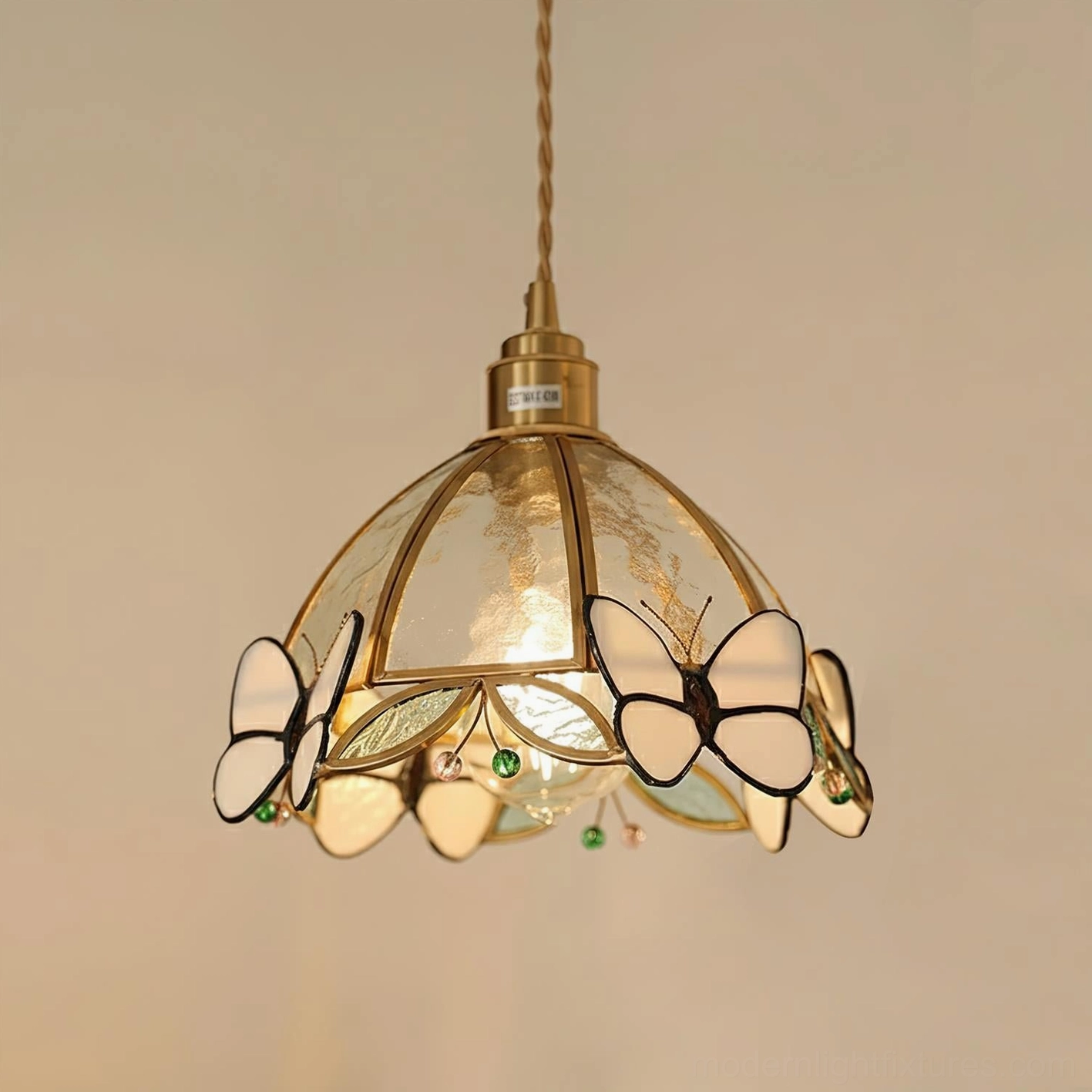 White butterfly stained glass pendant light with elegant frosted glass shade and brass frame hanging view