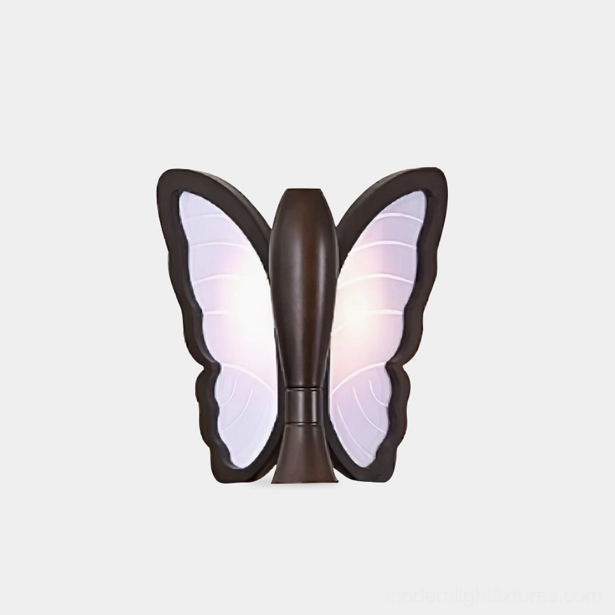 Modern butterfly table lamp with frosted acrylic wings and wooden body, front view on white background