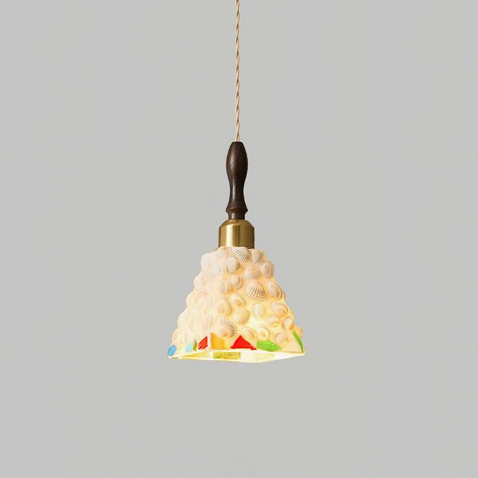 Cabana Model B coastal pendant light featuring pebble-textured glass shade with wood and brass accents