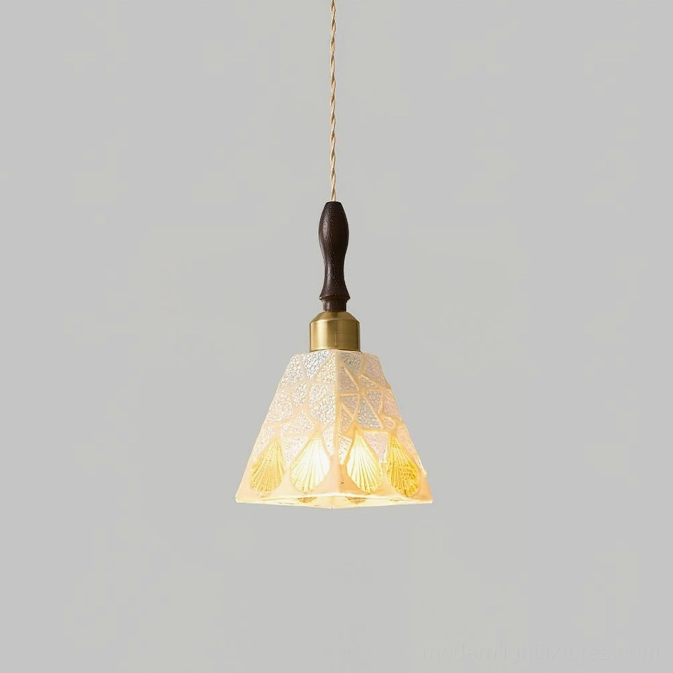 Cabana Model C coastal pendant light with seashell and leaf pattern glass shade in warm neutral studio background
