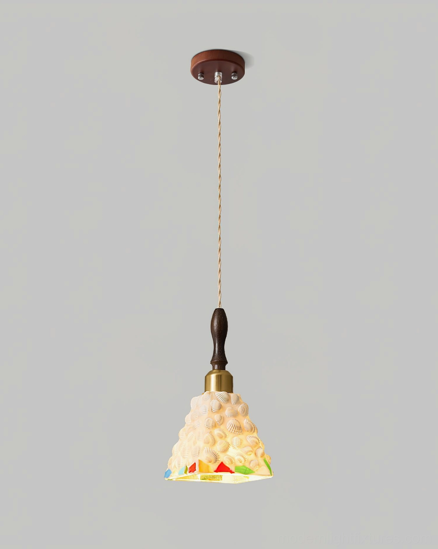 Cabana coastal pendant light studio product photography featuring twisted fabric cord and handcrafted glass shade detail