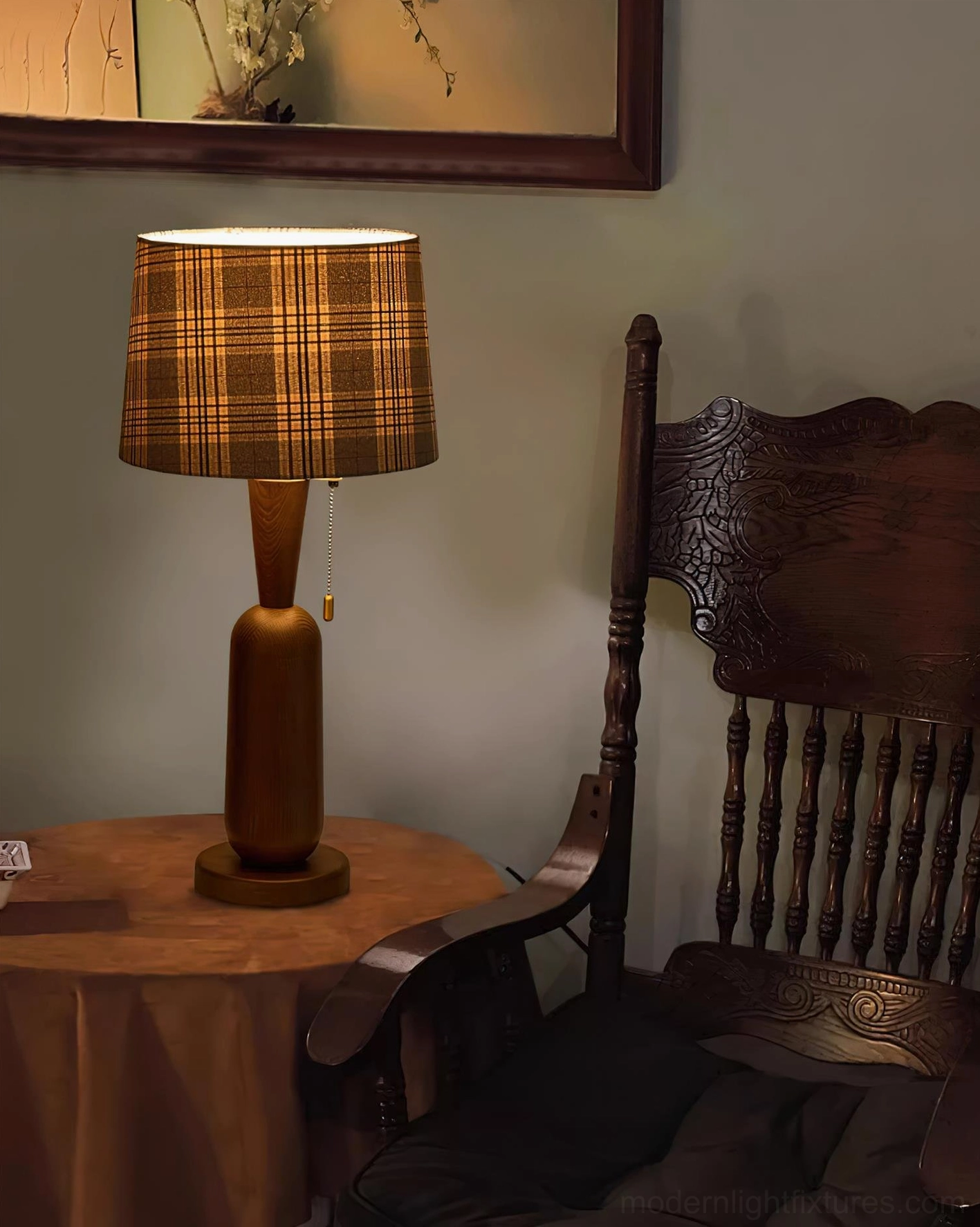 Cabin table lamp with warm plaid shade lighting a cozy reading environment