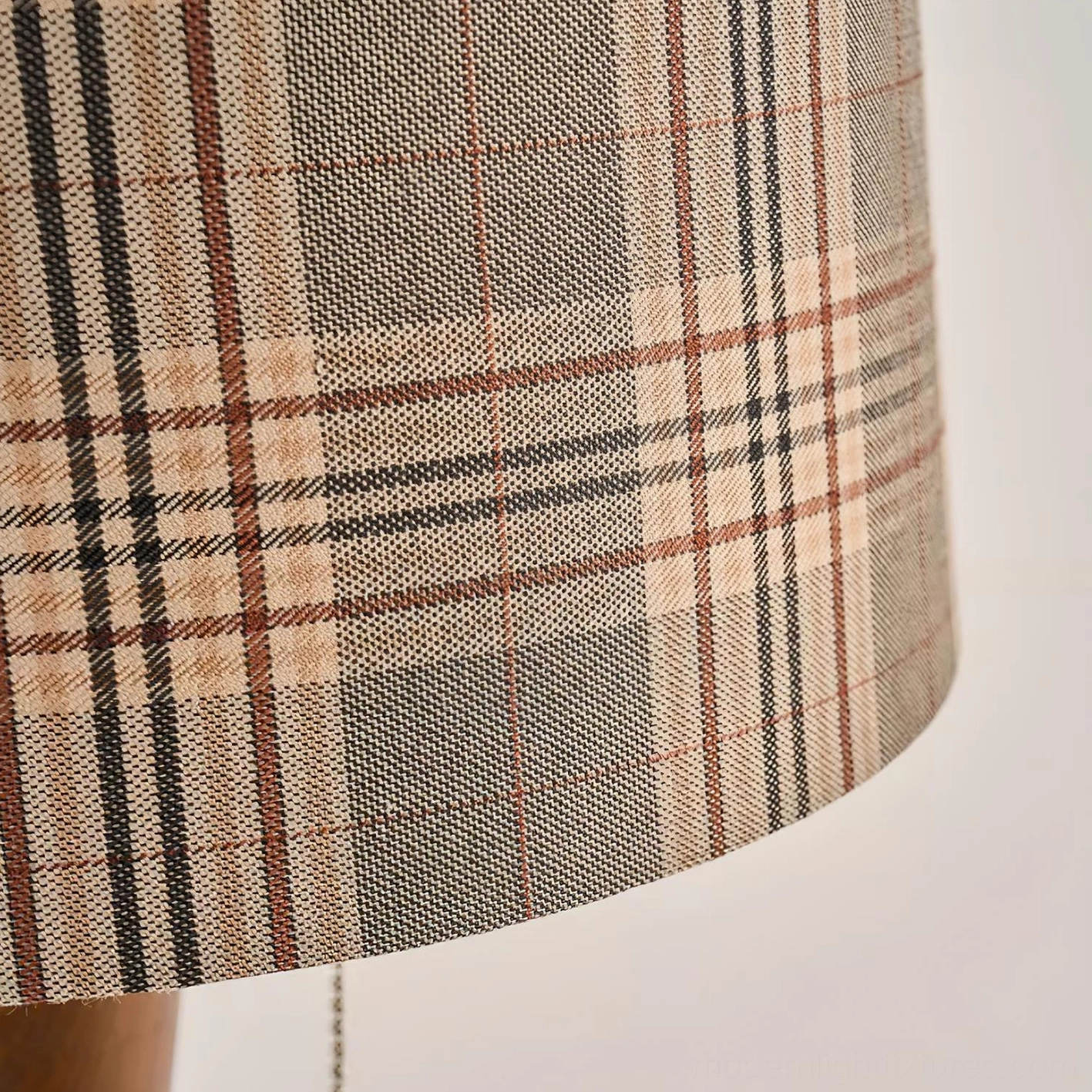 Cabin table lamp with wooden base complementing rustic interior décor style