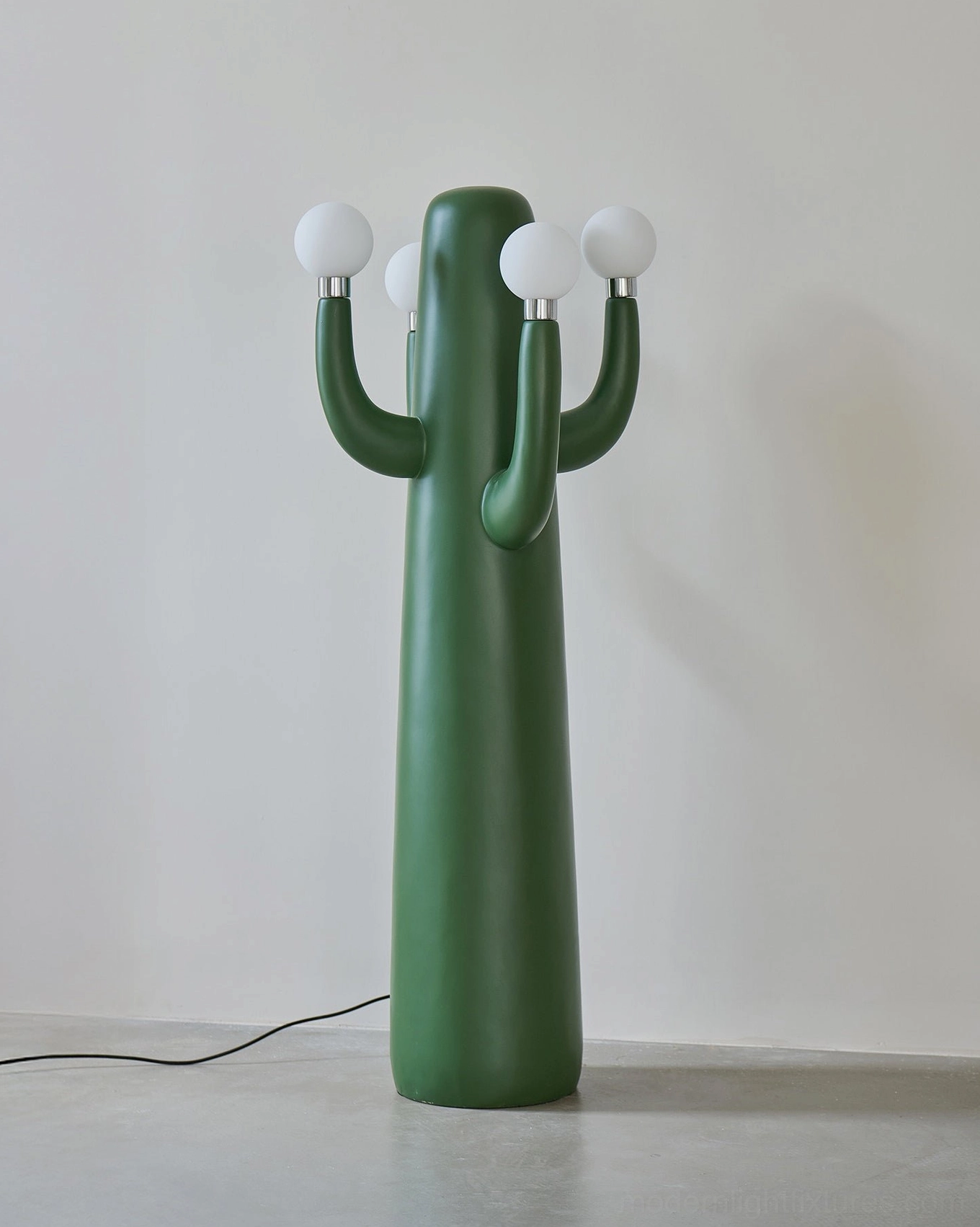Side profile of dark green cactus floor lamp showing smooth resin body and spherical frosted glass shades