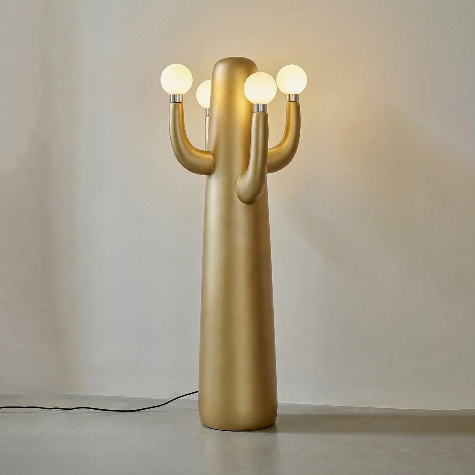 Matte gold cactus sculptural floor lamp with glowing frosted bulbs in luxury modern setting