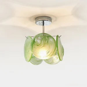Green marbled art glass semi-flush ceiling light with polished chrome canopy, close-up studio photography