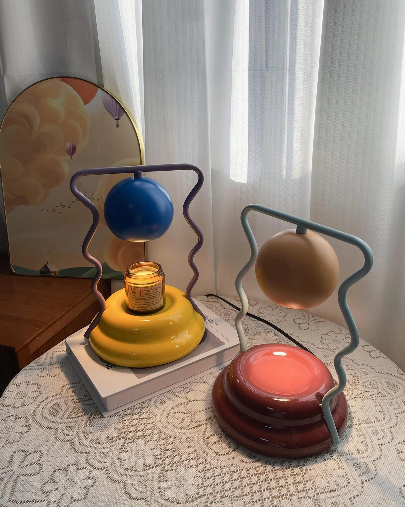 Caldas Candle Warmer Lamp lifestyle shot - modern artistic table lamp for home ambiance