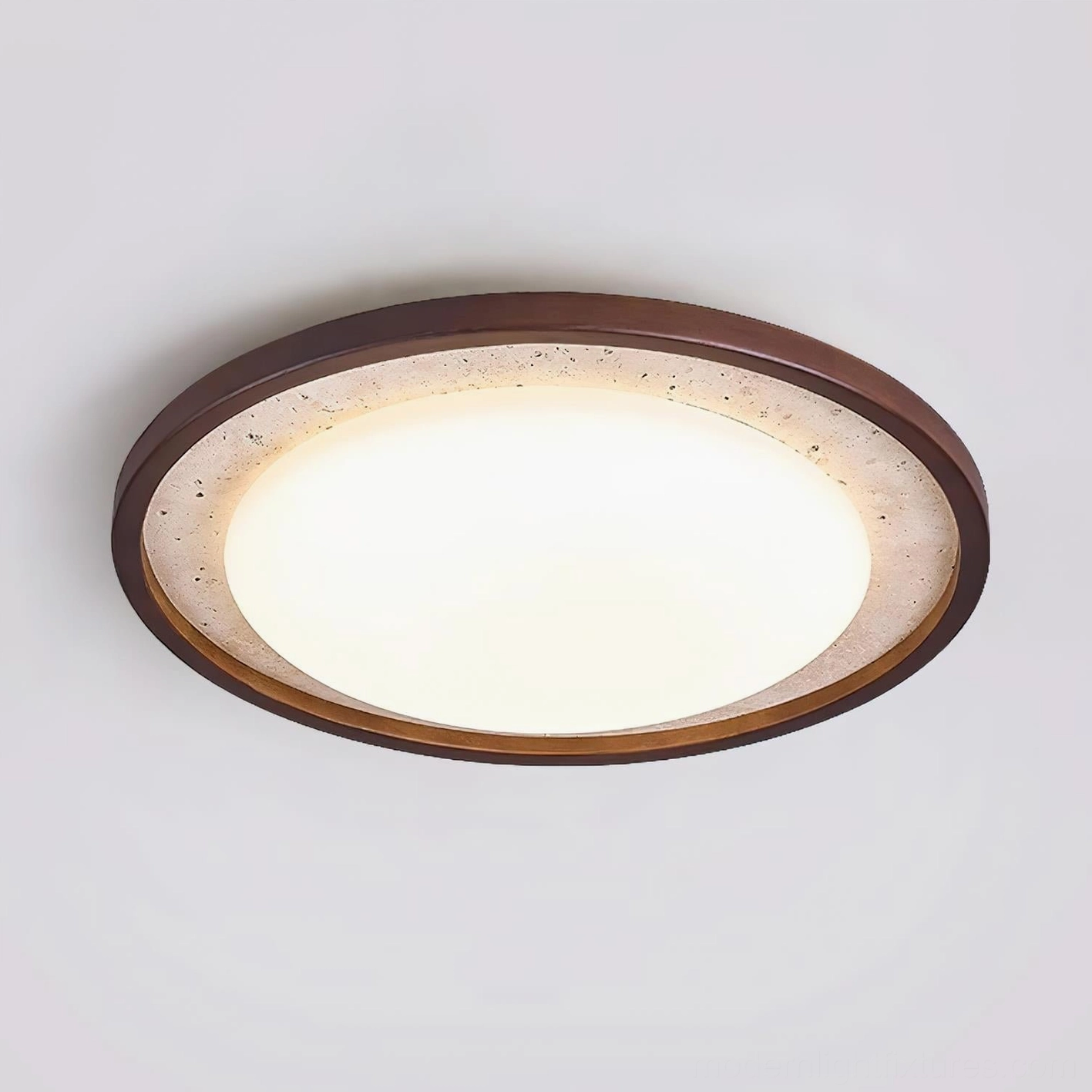 Caldo modern ceiling light fixture, flat-on view showing matte opal diffuser and layered stone wood trim