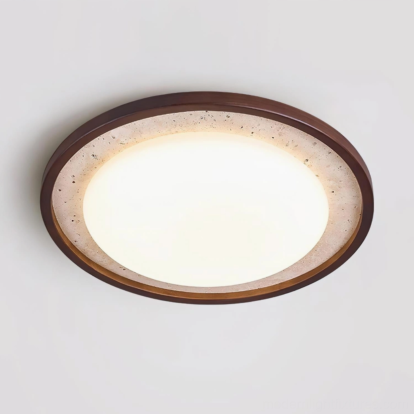 Caldo round ceiling light with natural material construction, minimalist design aesthetic