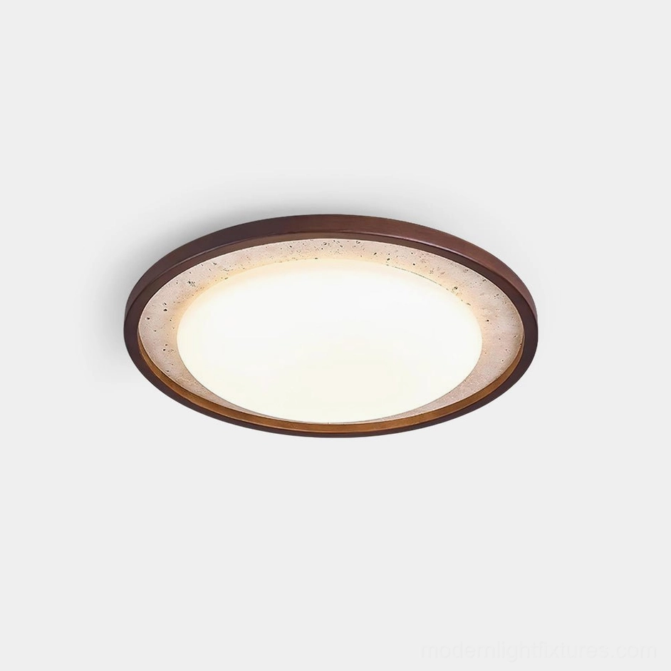 Caldo travertine ceiling light with walnut wood trim, studio product shot showing round flush mount design