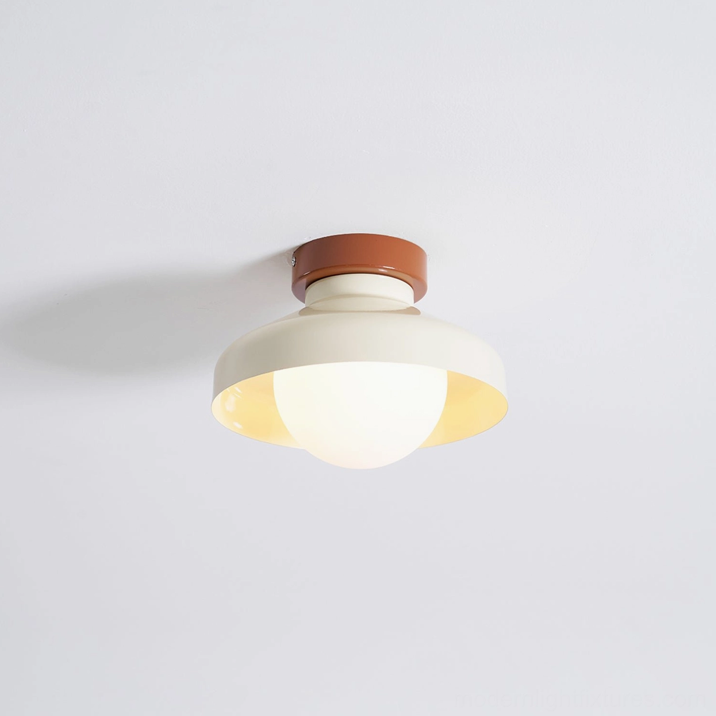 Calico modern flush mount ceiling light showing glass and metal construction quality