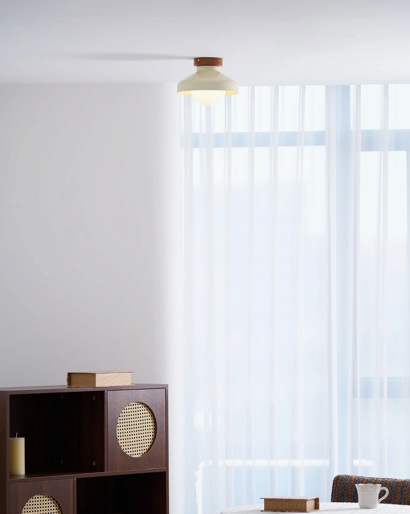 Calico modern ceiling light fixture detail showing leather trim and metal craftsmanship