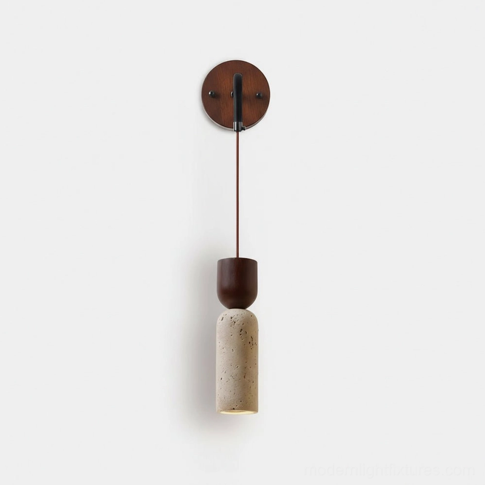 Calista Geode modern wall sconce with travertine stone shade and dark wood accents, front studio view