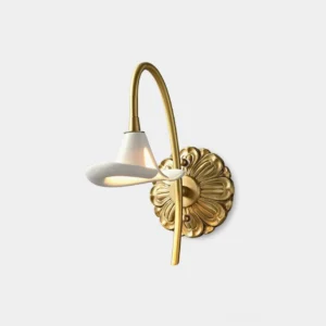 Calla lily brass wall sconce with petal-shaped white ceramic shade and antique brass arm, front studio view