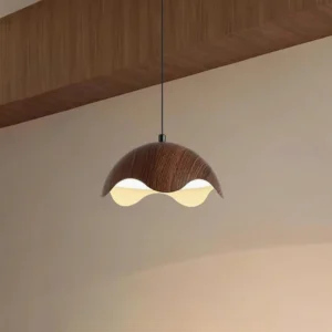 Modern Callan wooden pendant lamp with organic-inspired wavy shade in walnut finish, indoor eye-level perspective showing warm LED glow