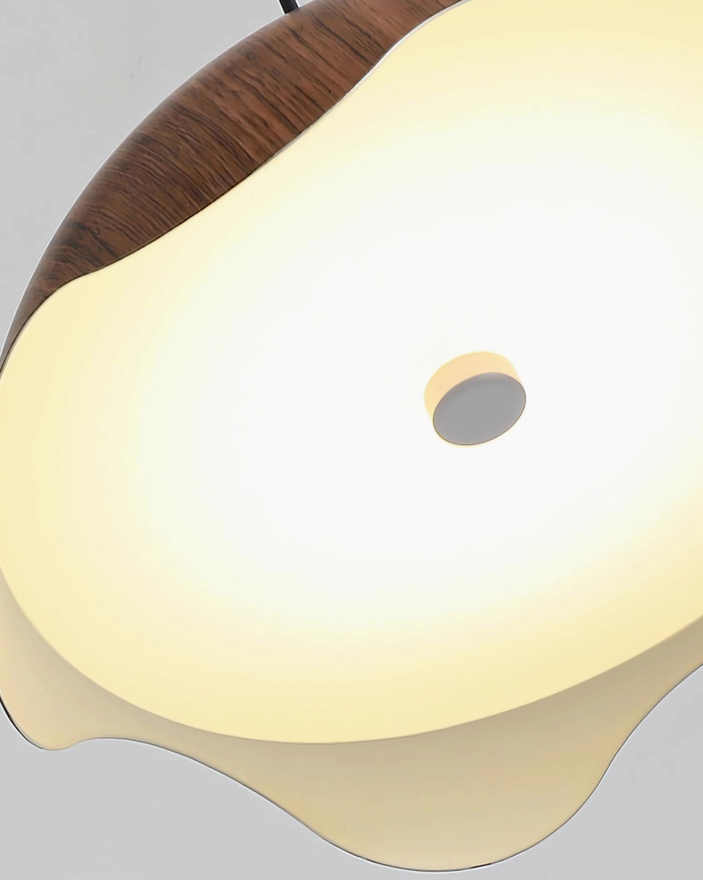 Callan sculptural organic pendant light with textured wooden shade in contemporary home interior design