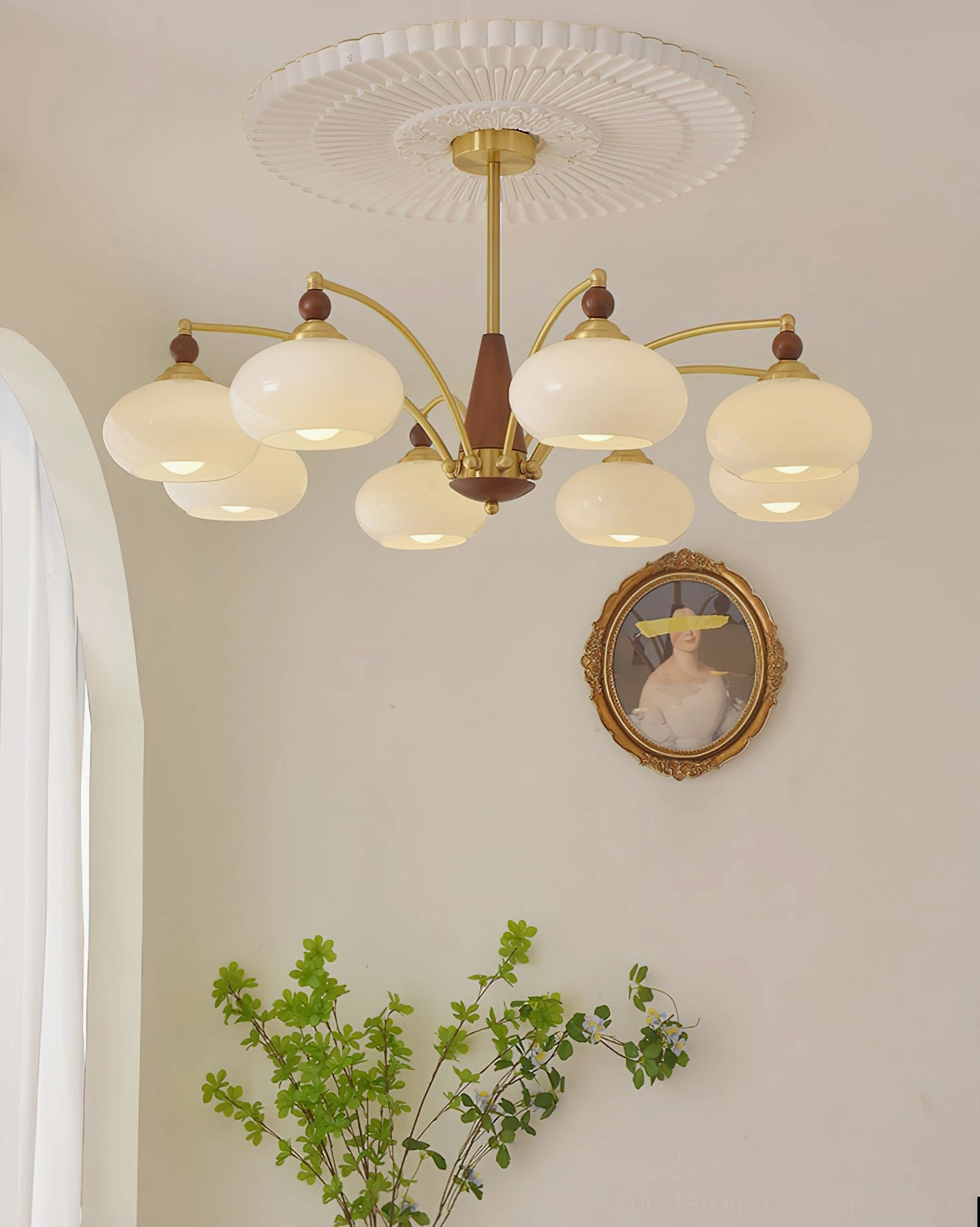 Calliope vintage 3-light chandelier fully lit - showing warm ambient light quality from caramel shades