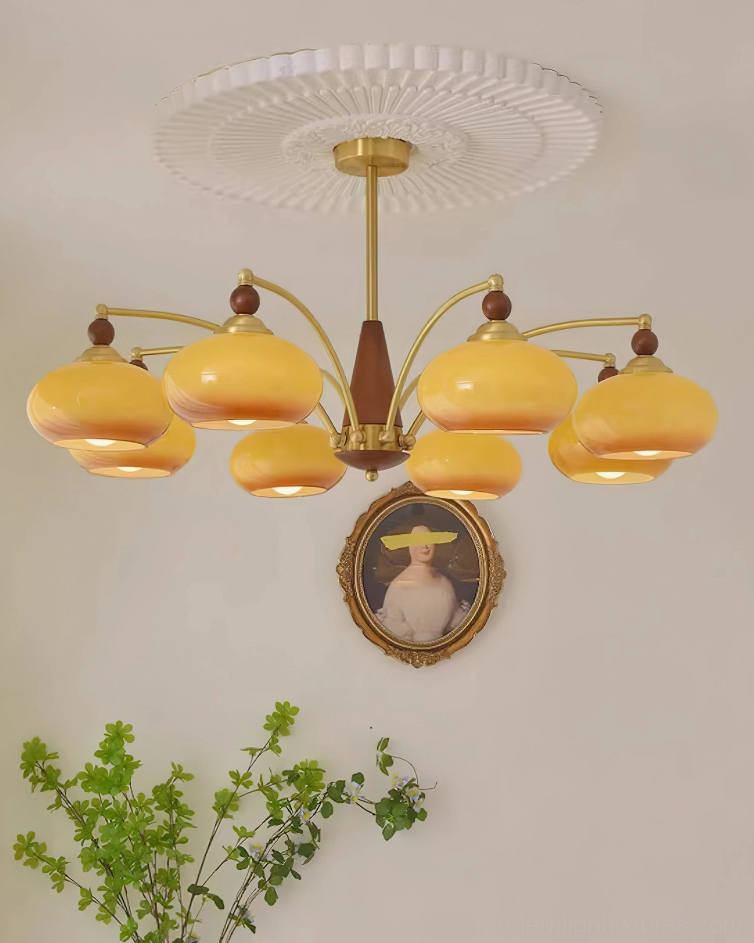 Vintage Calliope 8-light chandelier hanging in hallway interior - brass and wood construction with caramel tinted glass shades