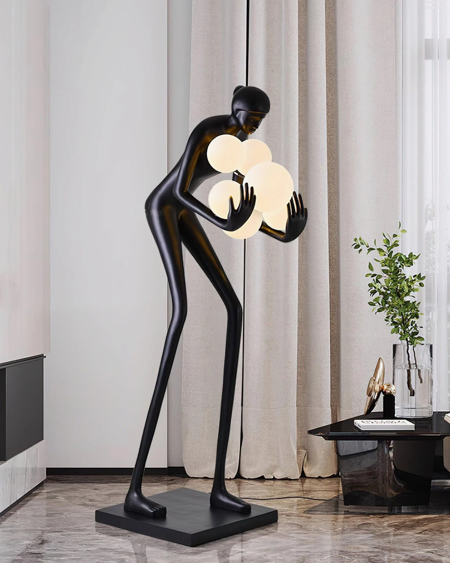 Calliope sculptural floor lamp three-quarter view modern living room green plant decor frosted white lighting ambient