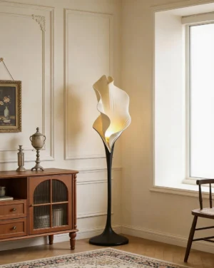 Callora sculptural floor lamp in vintage French style bedroom with warm glowing petal shade and wooden cabinet decor