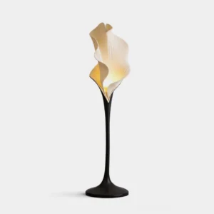 Callora calla lily floor lamp front view with matte black base and ivory pleated petal shade on white background