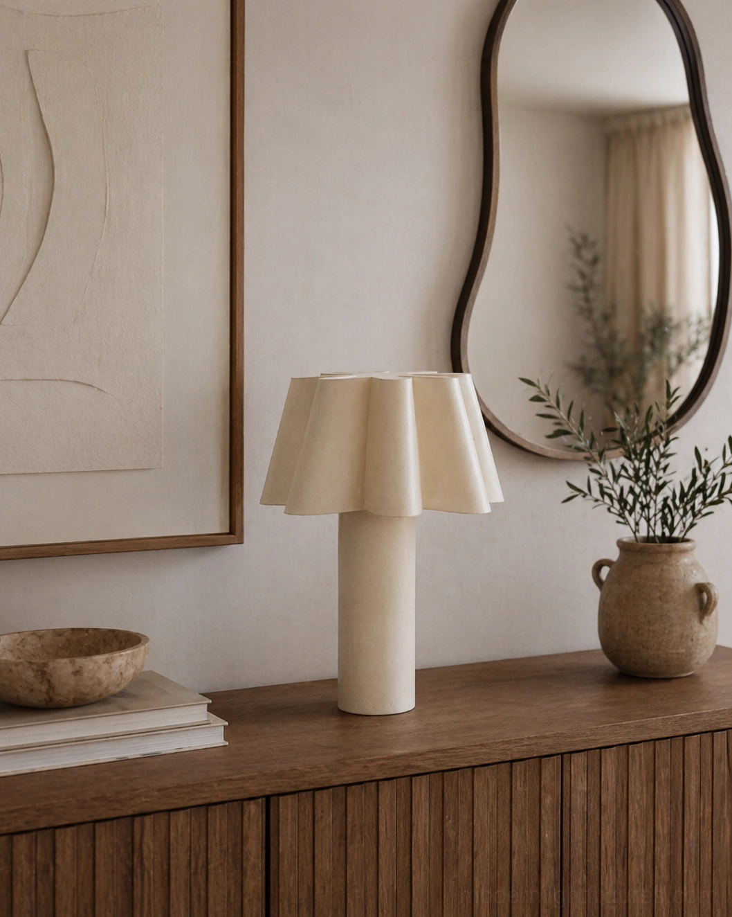 Calora white table lamp entryway console display with wall art and plant