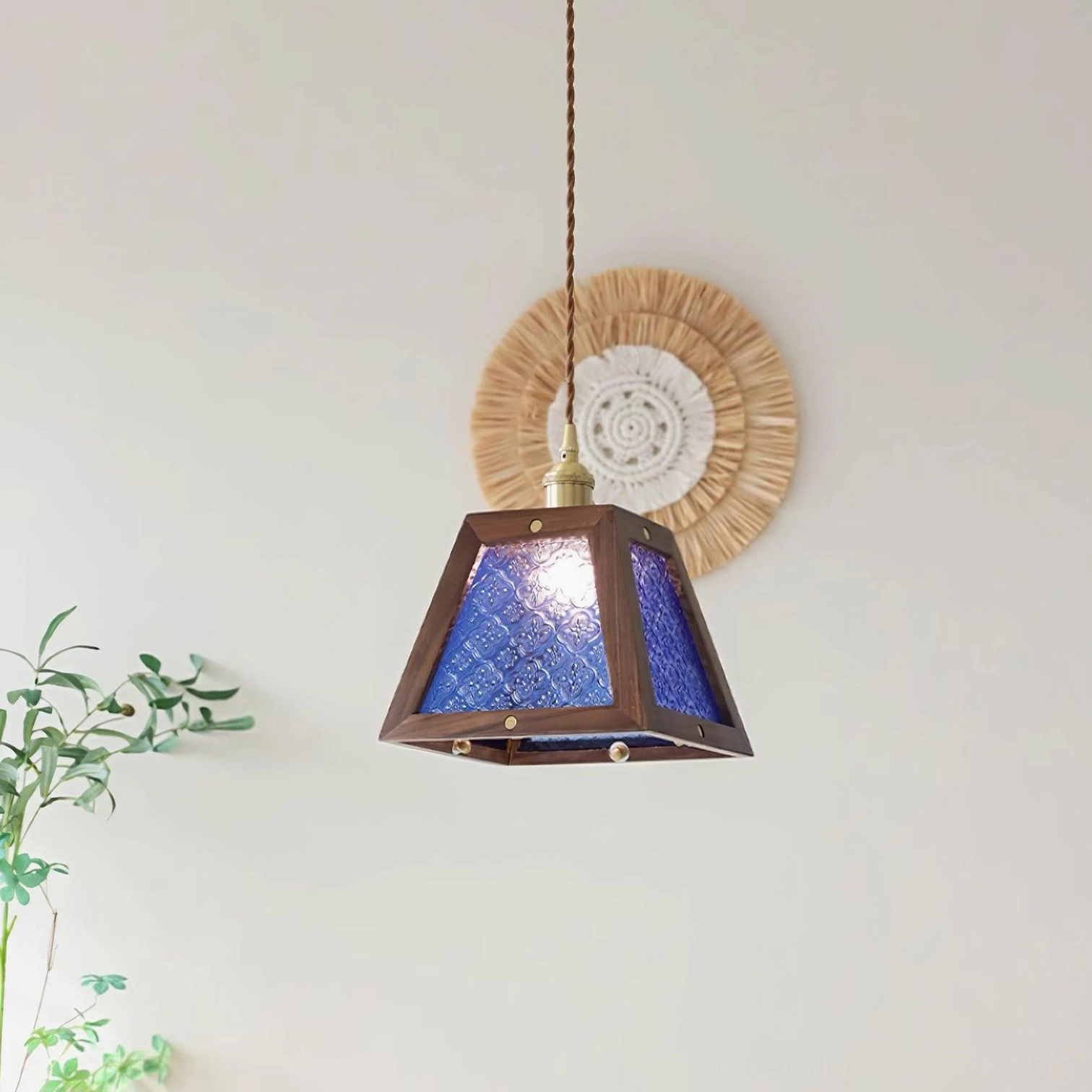 Artisan glass pendant lamp with hand-patterned shade, vintage home interior application