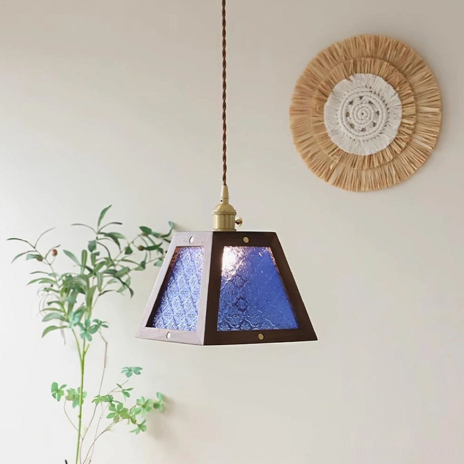 Calvi glass pendant lamp with blue embossed shade and dark wood frame, color variant display