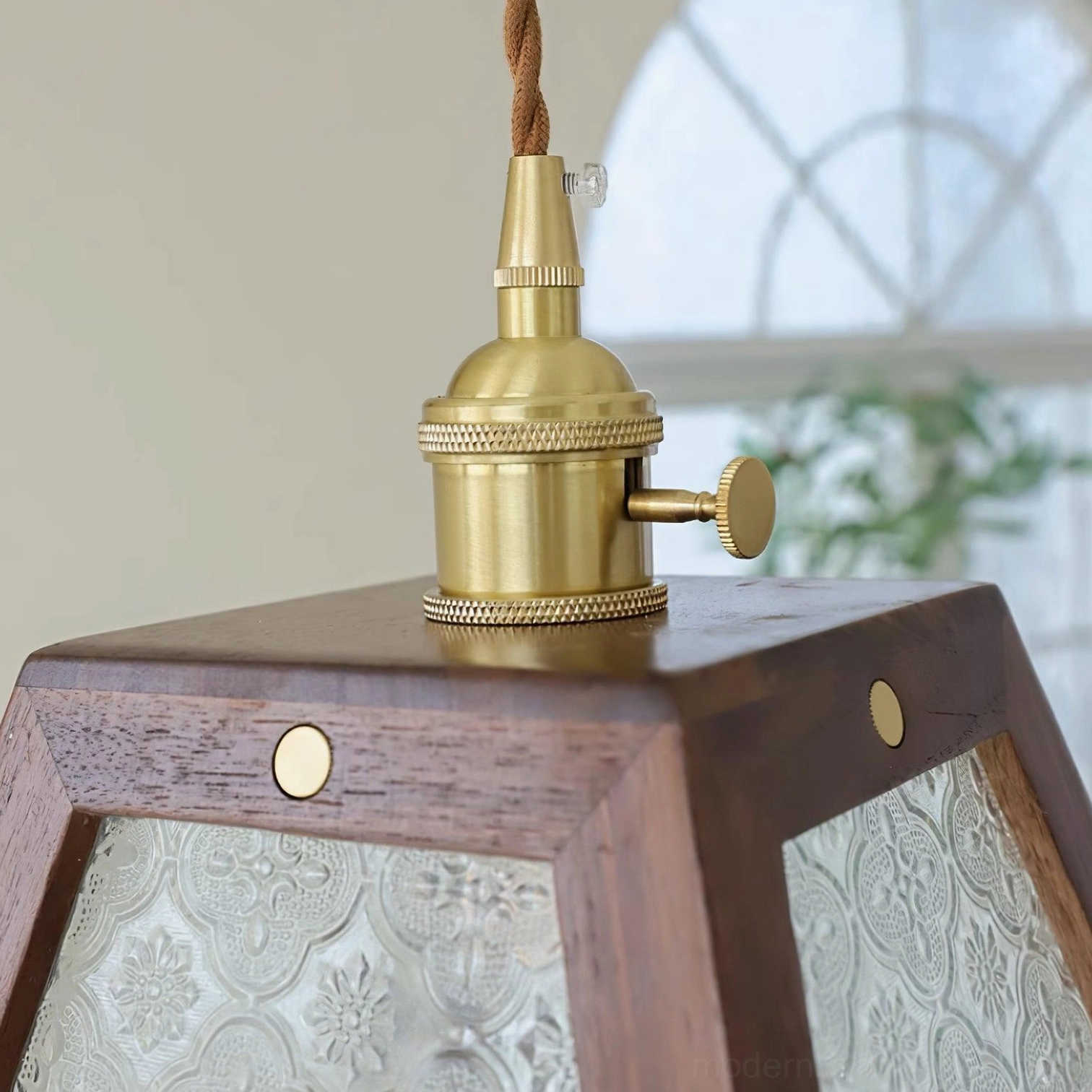Glass pendant lamp with embossed pattern shade and solid wood frame, installed ceiling fixture view